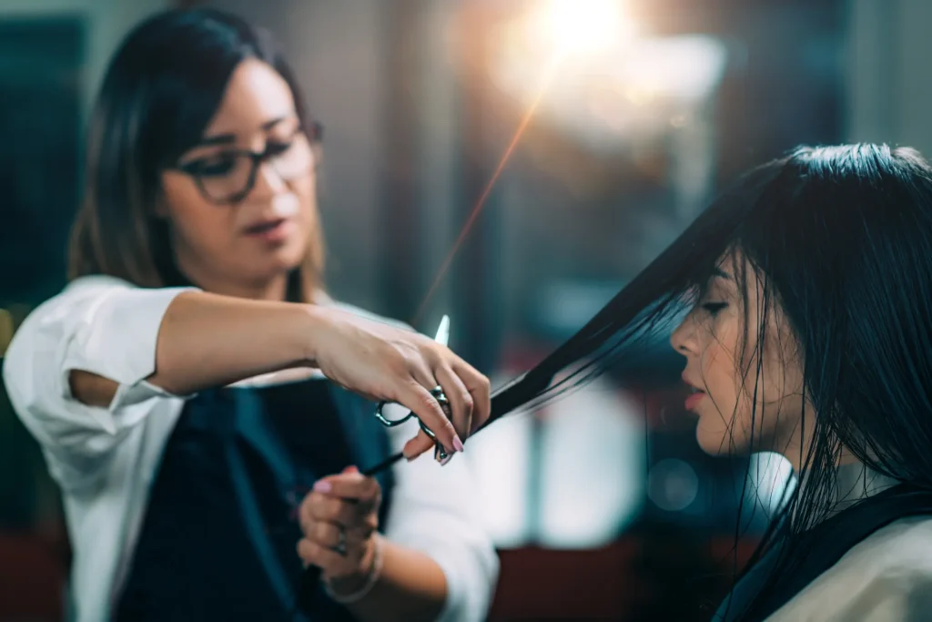 woman with hair being cut at salon 2026 03 10 03 13 23 utc
